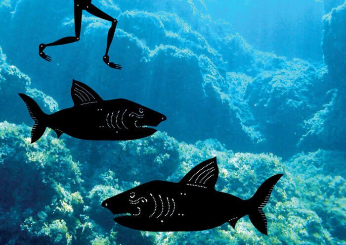 A silhouette of two fish and a child's legs with a background of underwater coral.