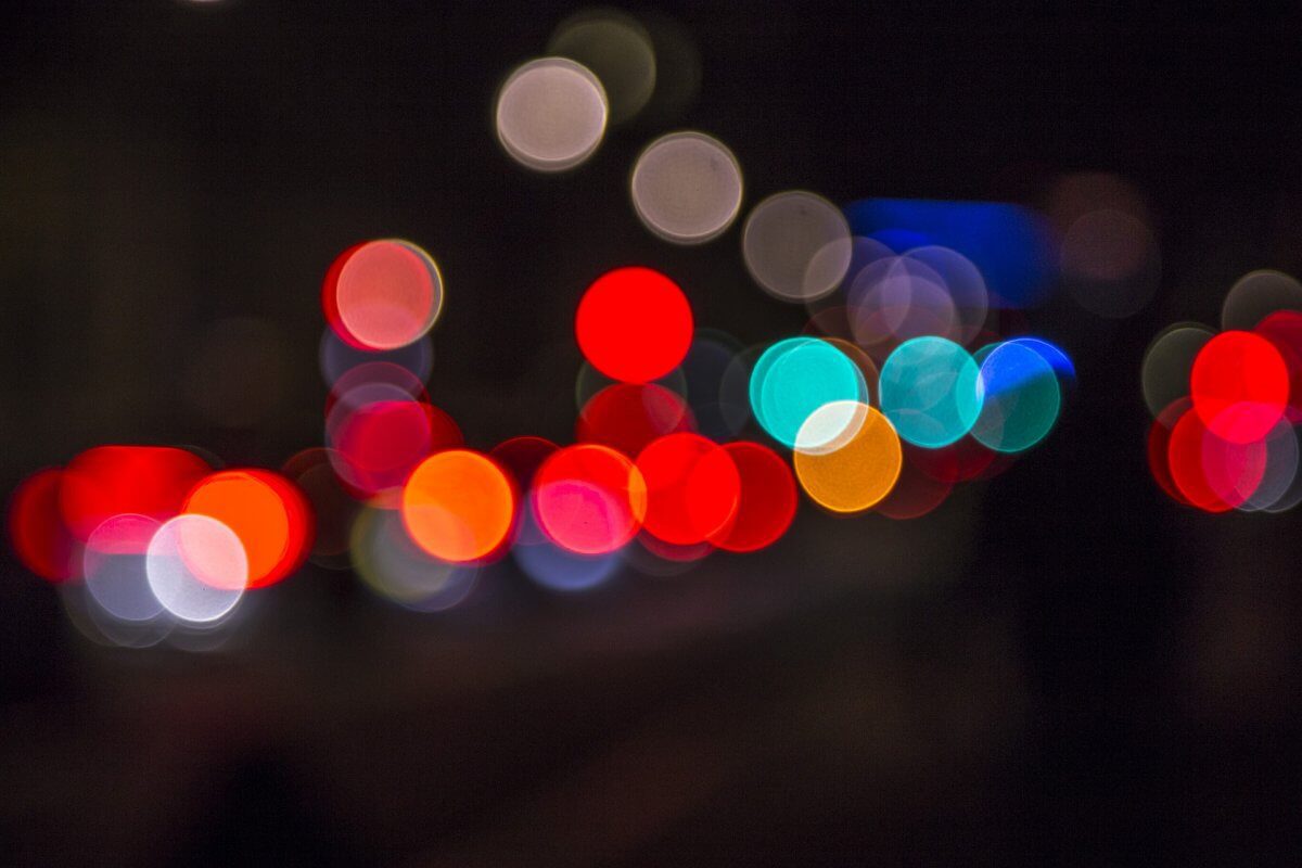 Blurred lights on a black background.