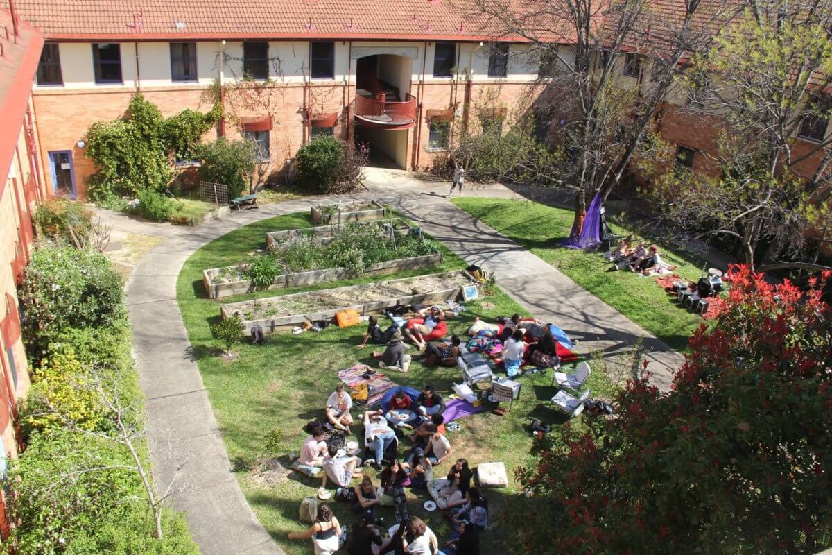 A birds eye view of the student cooperative courtyard. Showing residents resting in the sun.