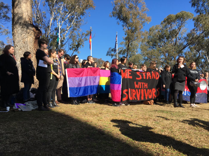 students protesting at the release of the AHRC survey results