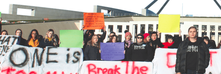 protesting sexual assault on campus outside parliament house