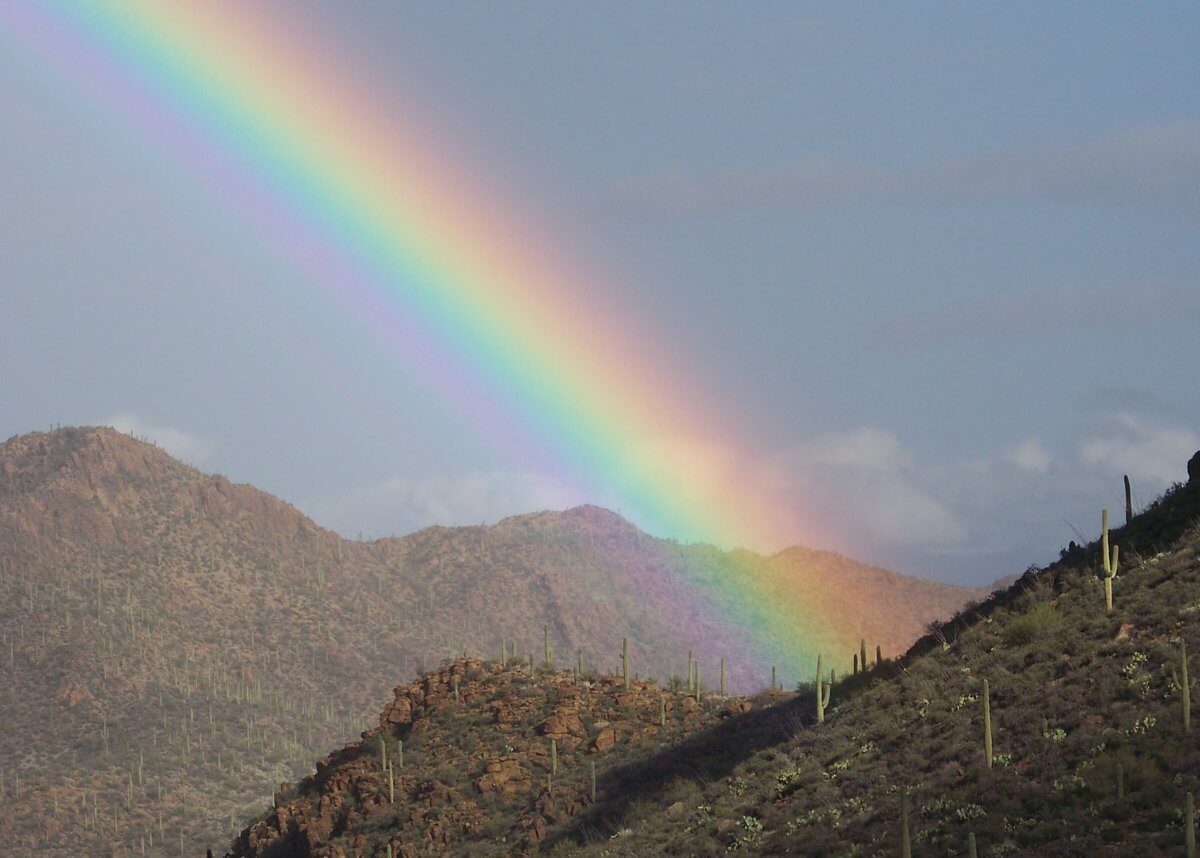 rainbow in an open valley
