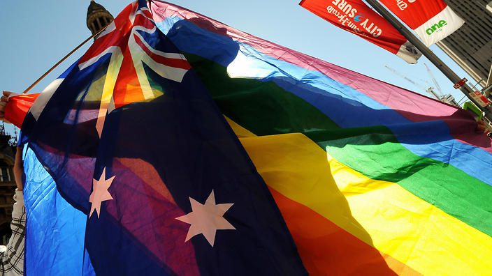 australian flage with rainbow background