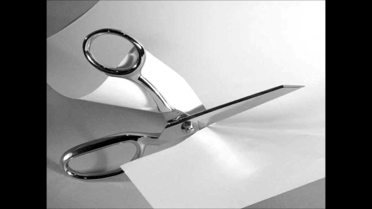 scissors cutting paper
