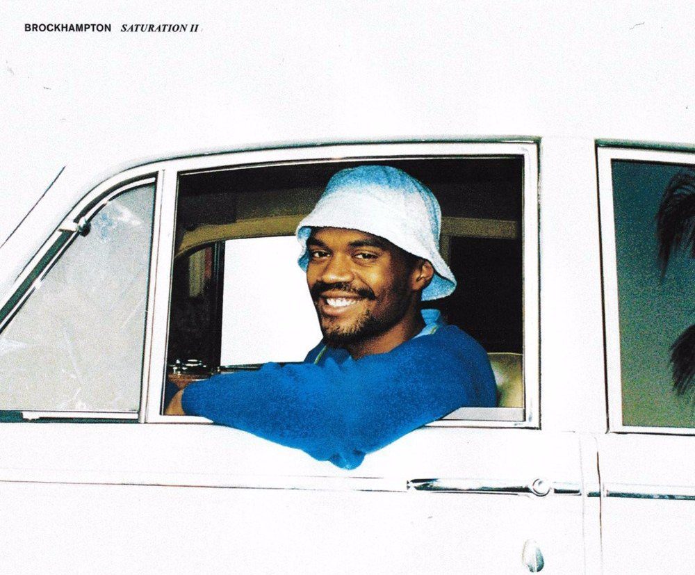 Brockhampton saturation 2 album cover, featuring a man in the car of a window