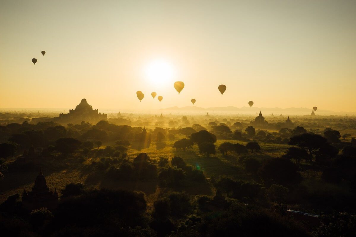 An image of a sunset over some hills in Myanmar