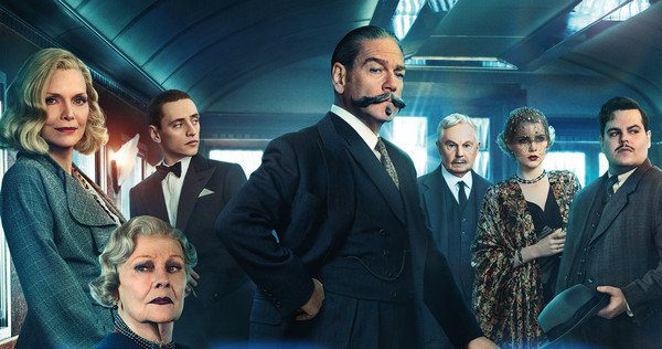 Cast shot from Murder on the Orient Express, featuring Kenneth Branagh as Poirot and an assortment of other characters aboard the Orient Express