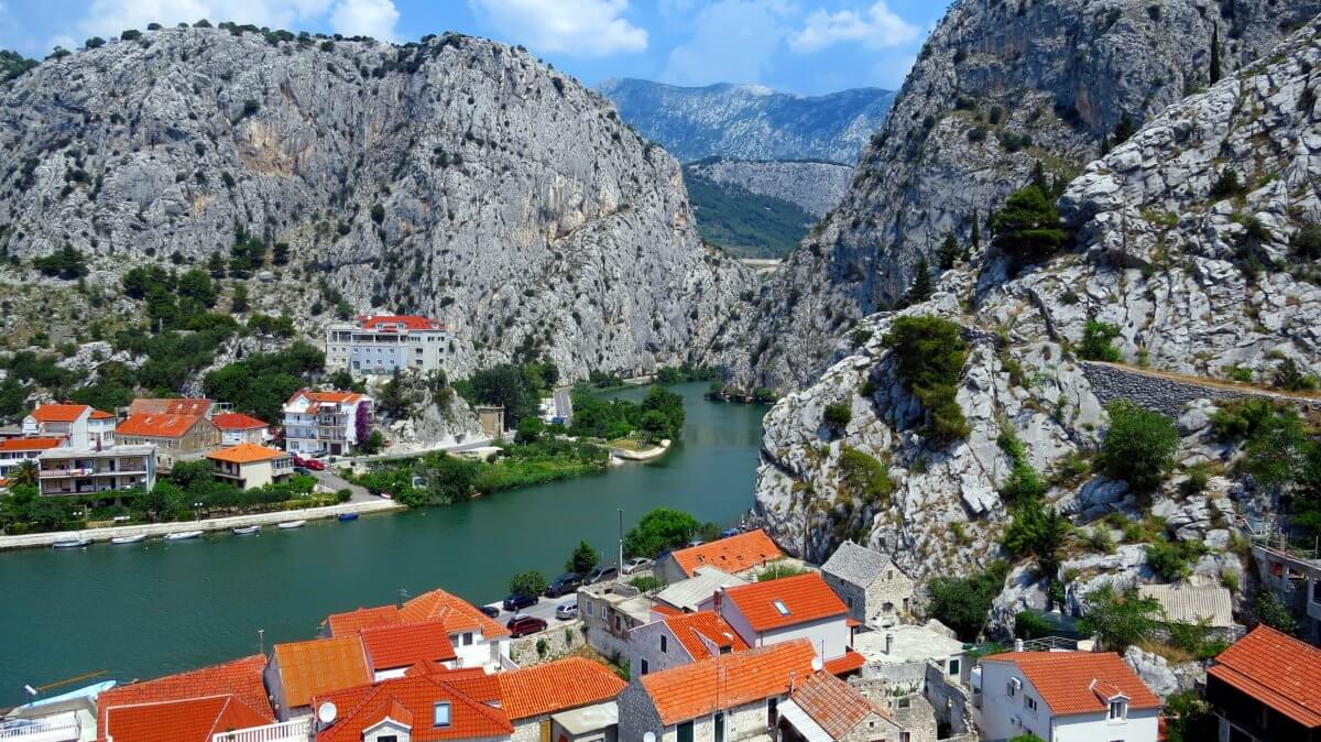 Red roofed houses by a lake in Croatia